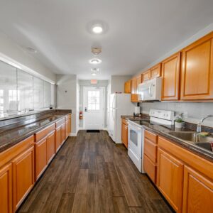 Large galley-style kitchen in clubhouse at Florida Caverns RV Resort