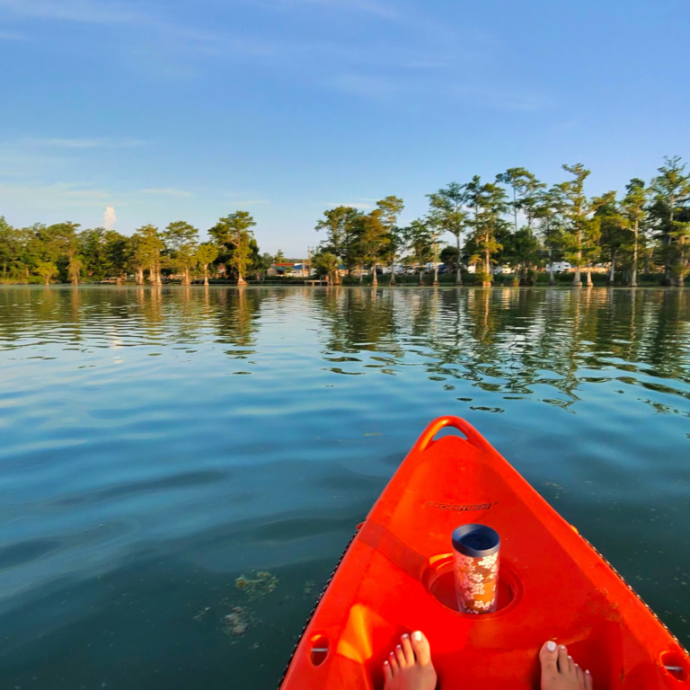 paddler enjoying morning coffee floating on Merritt's Mill pond